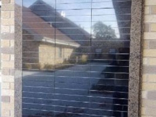 flat brown black granite memorial wall