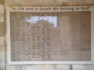 curved tan granite memorial wall